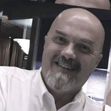 bald man smiling