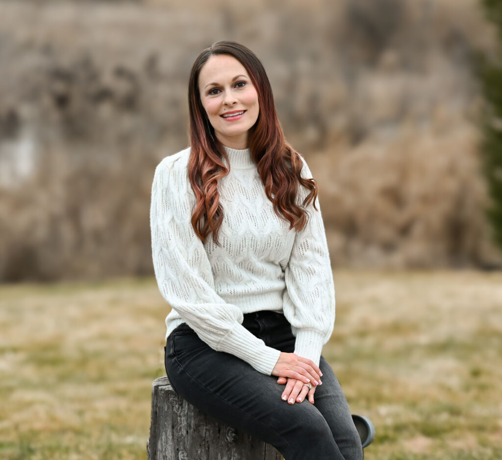 woman on tree trunk